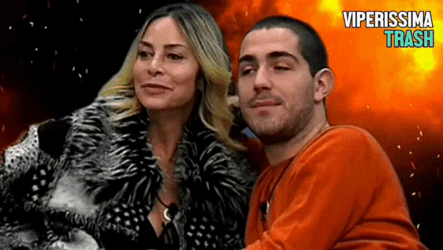 a man and a woman are posing for a picture with the words viperissima traccia written above them
