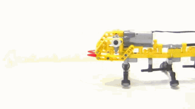 a snake made out of lego with a red tongue sticking out