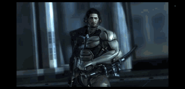 a man in a futuristic suit holds a gun