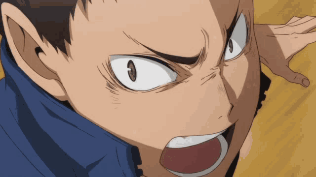 a close up of a person 's face with a very angry look on their face
