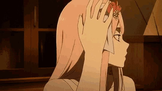 a girl with long pink hair is wearing a flower headband .