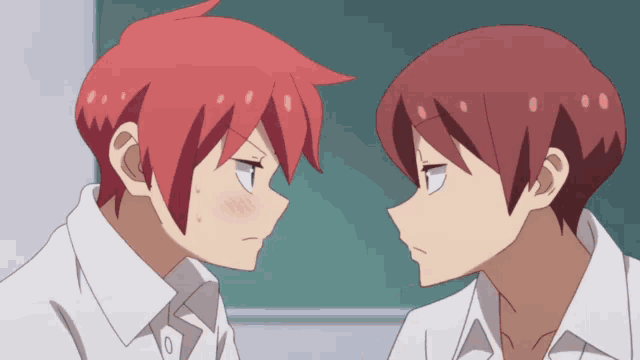 two anime characters with red hair are looking at each other and one has a surprised look on his face
