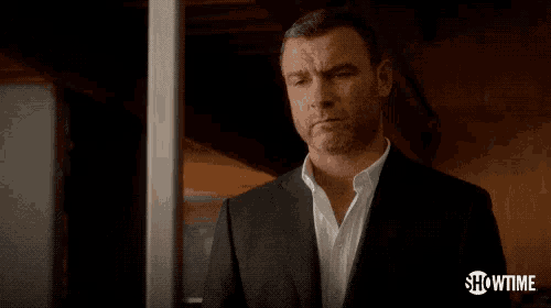 a man in a suit and white shirt says i 'll take care of it .