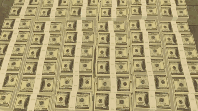 several stacks of 100 dollar bills are lined up on a table