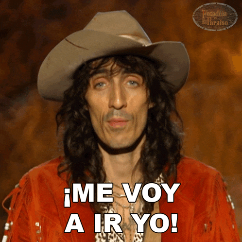 a man wearing a cowboy hat and a red jacket says me voy a ir yo