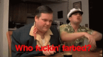 two men are sitting at a table and one of them is asking who fuckin ' tarbed ?