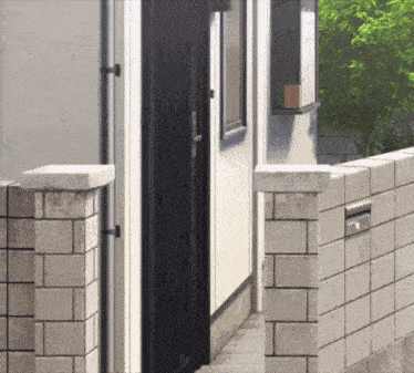 a brick wall with a mailbox in the middle