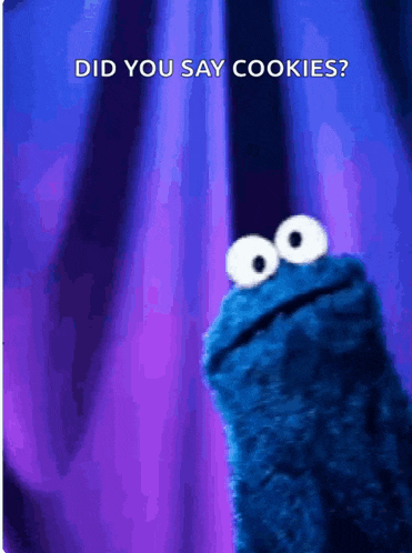 a cookie monster is standing in front of a purple curtain and asking did you say cookies .