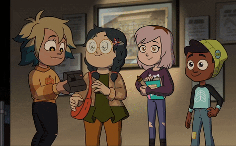 a group of cartoon characters standing next to each other with one wearing a sweater that says polaroid