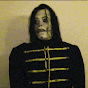 a man with a skeleton costume on is standing in front of a white wall .