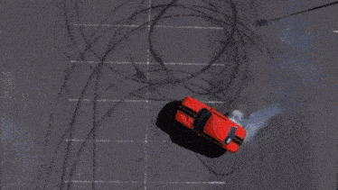 a person is holding the steering wheel of a car