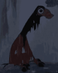 a close up of a cartoon character with a long neck standing in the snow .