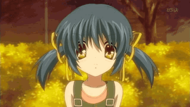 a little girl with blue hair and pigtails stands in front of a bs-x logo