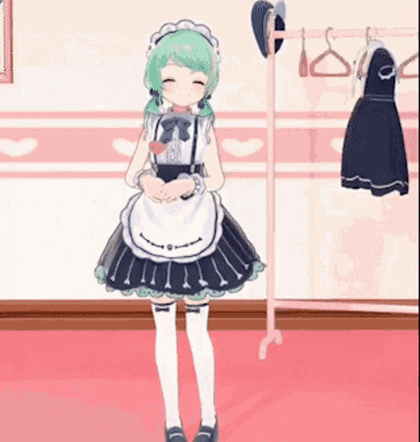 a girl in a maid costume is standing in front of a hanger with clothes hanging on it .
