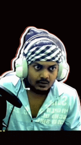 a man wearing headphones and a bandana with the number 2012 on his shirt