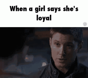 when a girl says she 's loyal , a man in a jacket is looking at the camera .