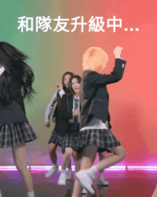 a group of girls in school uniforms are dancing on a stage