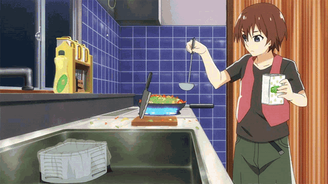 a boy is cooking in a kitchen while holding a can of green juice