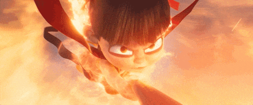 a cartoon character is flying through the air with flames coming out of his mouth and eyes .
