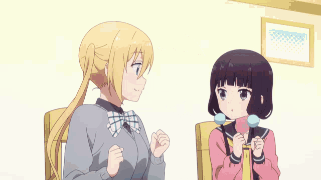 two anime girls are hugging each other and one has a blue ball in her hair
