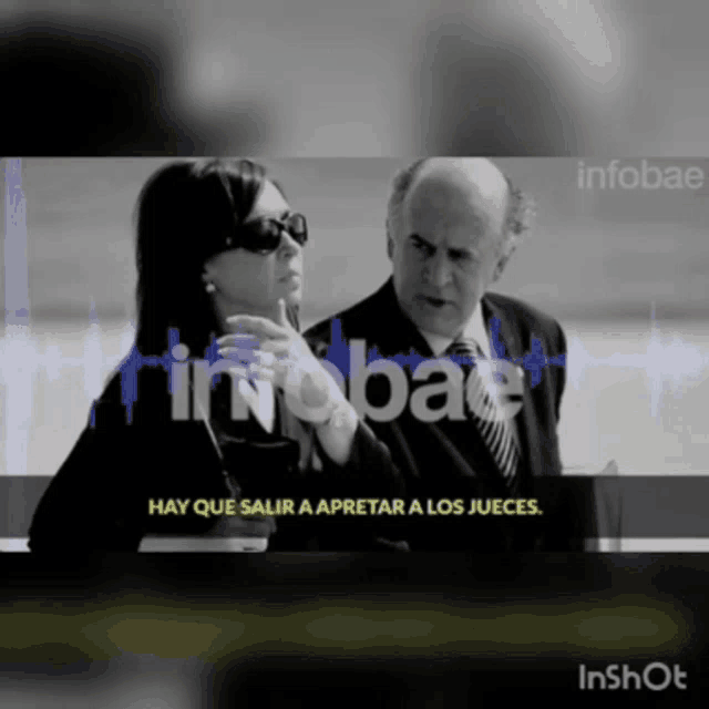 a black and white photo of a man and a woman with the words hay que salir a apretar a los jueces on the bottom