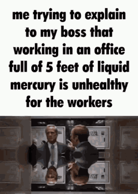 a man in a suit and tie is standing in front of a mirror and talking to his boss .