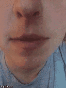 a close up of a person 's mouth and nose
