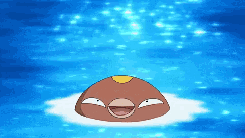 a cartoon character is floating in the water with a big smile on its face