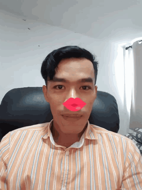 a man with red lips on his face