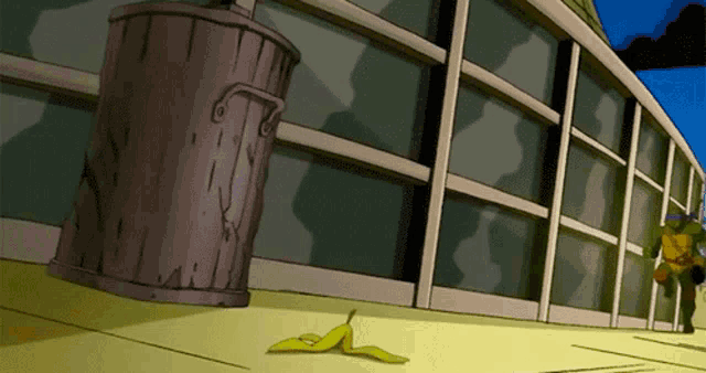 a cartoon scene with a banana peel laying on the ground