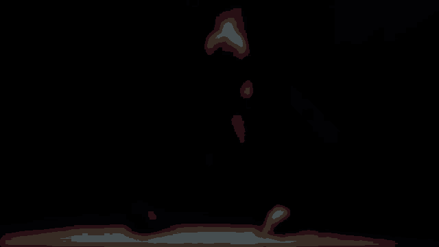 a blurred image of a person 's face with a heart shaped mouth