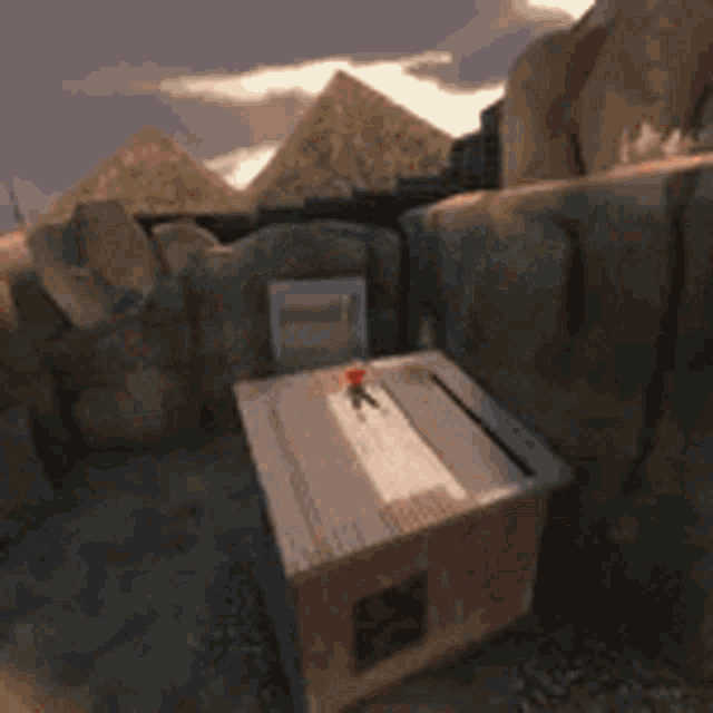 a man in a red shirt is jumping on a trampoline .