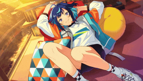 a girl with blue hair is laying on a colorful couch