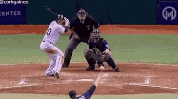 a baseball player with the number 10 on his jersey is swinging his bat