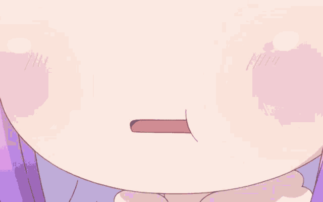 a close up of a girl 's face with her tongue out