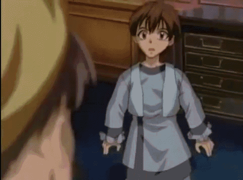 a girl in a blue shirt is standing next to another girl