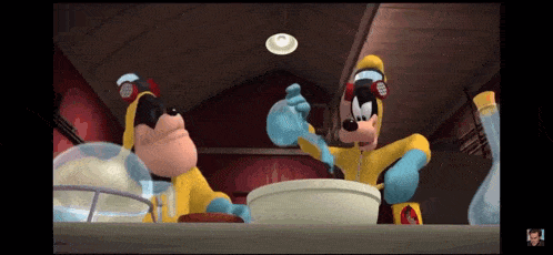 mickey mouse and goofy are sitting at a table with a bowl of food and a spoon .