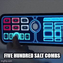 a person is pressing a button on a remote control that says five hundred salt combs on it