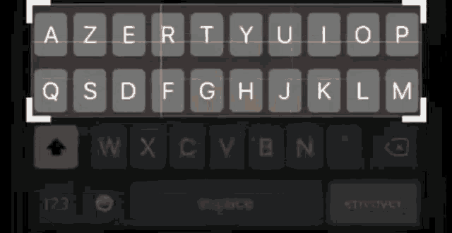 a black keyboard with the letters azertyuiop qsdfghjklm