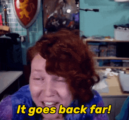 a woman says it goes back far while smiling