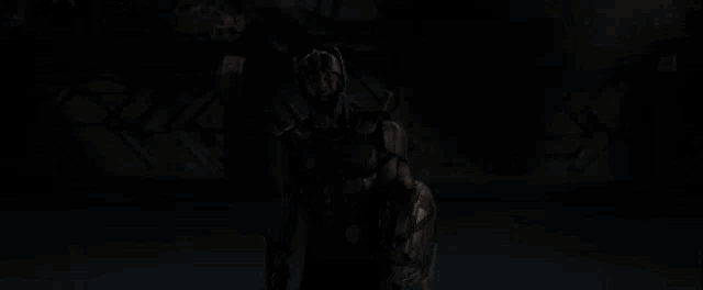 a man with a shield and a helmet on his head