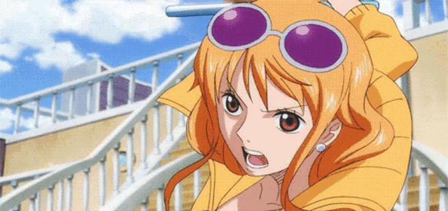 a girl wearing sunglasses and a yellow jacket is standing on stairs