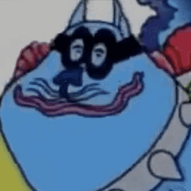 a close up of a cartoon character 's face with a long tongue coming out of it .