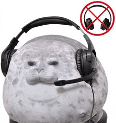 a stuffed seal wearing headphones with a microphone .