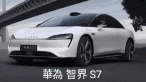 a white car with chinese writing on it is parked in front of a bridge