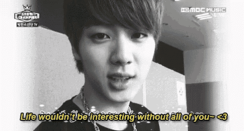 a black and white photo of a young man with the caption life wouldn t be interesting without all of you < 3