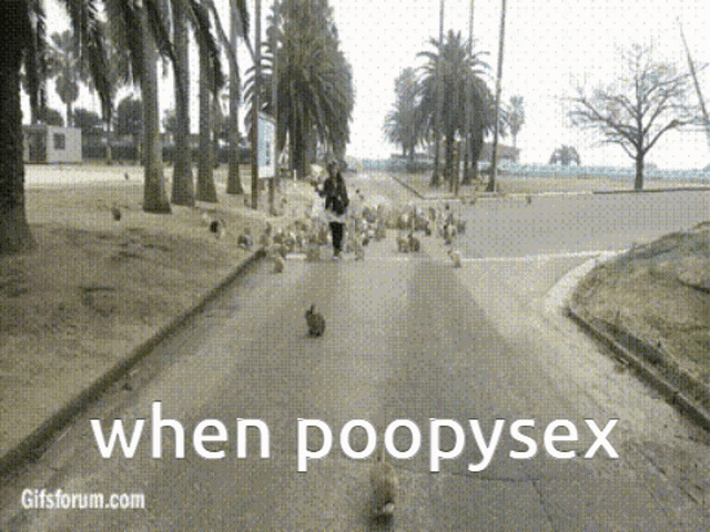 a gif from gifsforum.com shows a person walking down a street