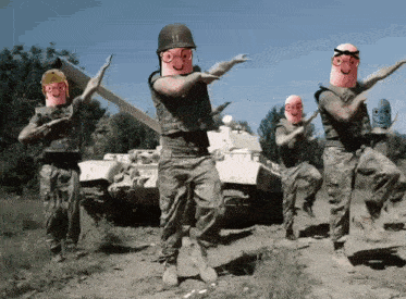 a group of soldiers are dancing in front of a tank with the number 11 on the helmet