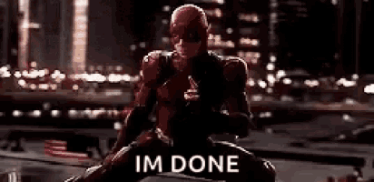 daredevil is kneeling down in front of a city skyline and says `` i 'm done '' .
