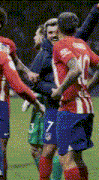 a soccer player wearing a red and white jersey with the number 10 on it